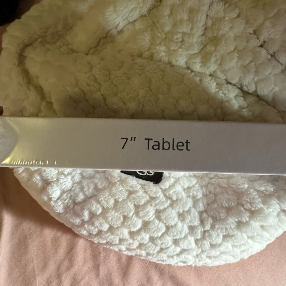 Sealed never opened, 7-Inch Tablet with Sealed Wireless Headphones Set 🎧